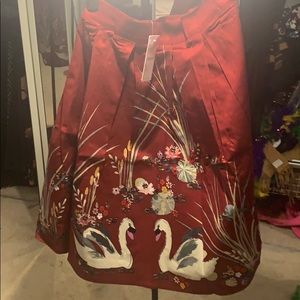 Red skirt with swan designs